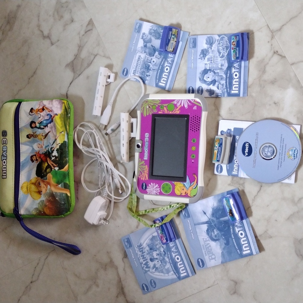 Innotab 3S V- tech game system with 4 games.